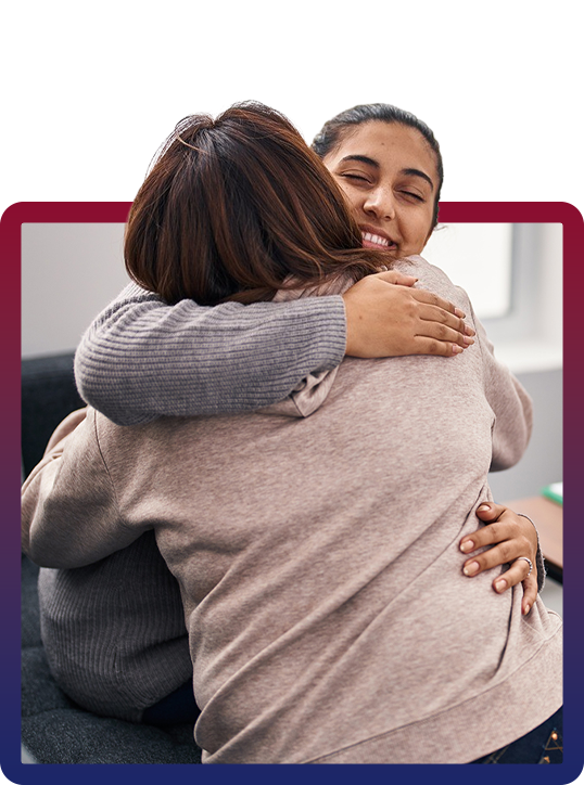 Women Hugging Quick Link Photo - Victim Assistance